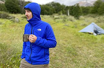 The North Face Ventrix Hoodie synthetic insulated jacket (holding coffee cup in camp)