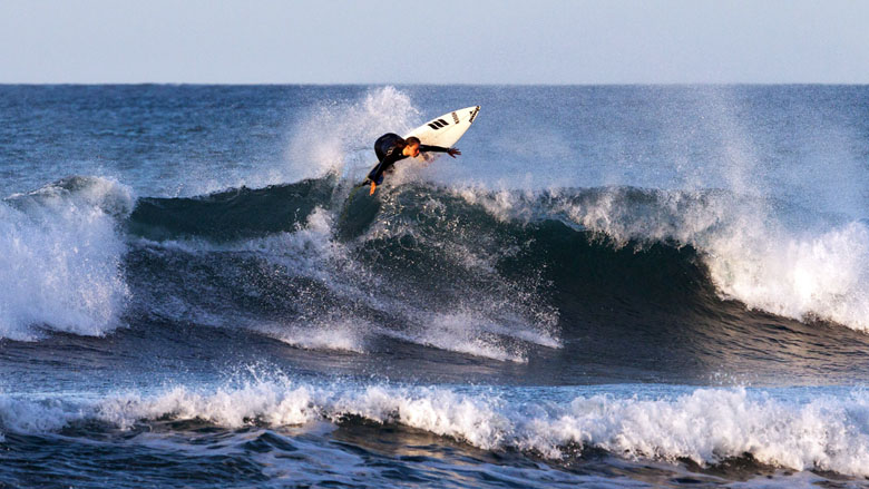 Surfing in Taranaki, New Zealand