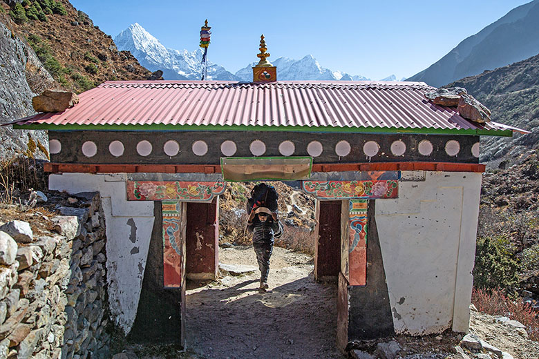 Nepal Trek (porter carrying gear).jpg