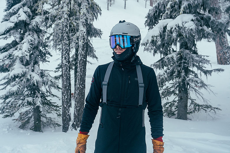 REI First Chair GTX Bibs (standing in snowy forest)