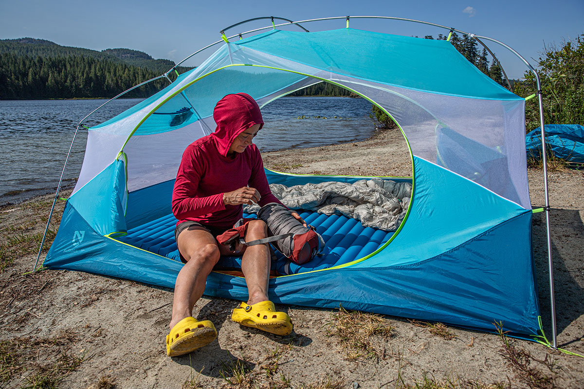 Camp shoes (sitting in tent wearing Crocs)