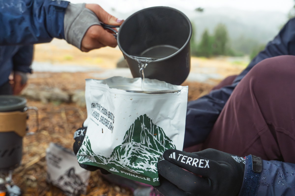 Backpacking food (pouring water into Pinnacle Foods meal)