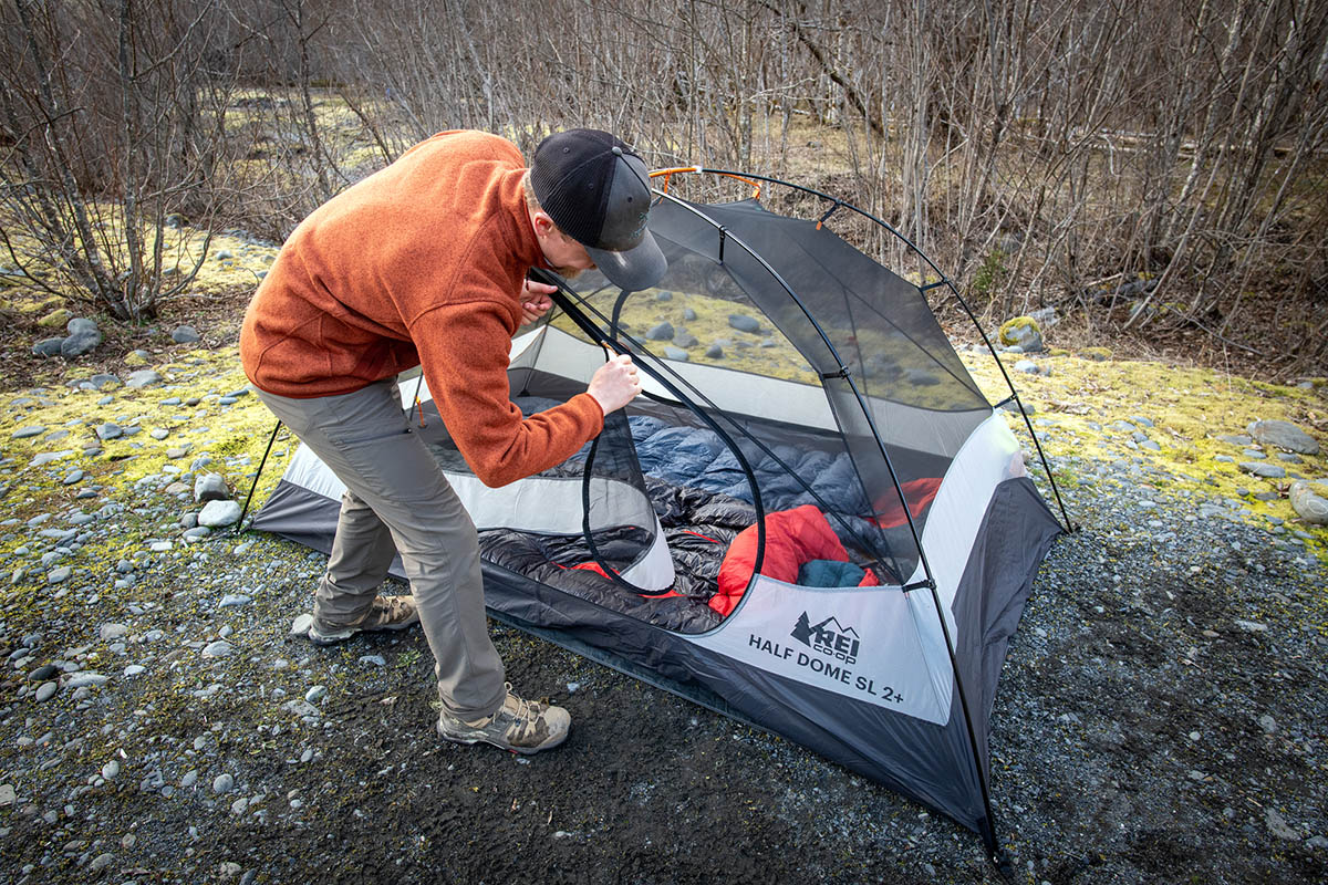 Backpacking tent (zipping up REI Co-op Half Dome SL 2 Plus)