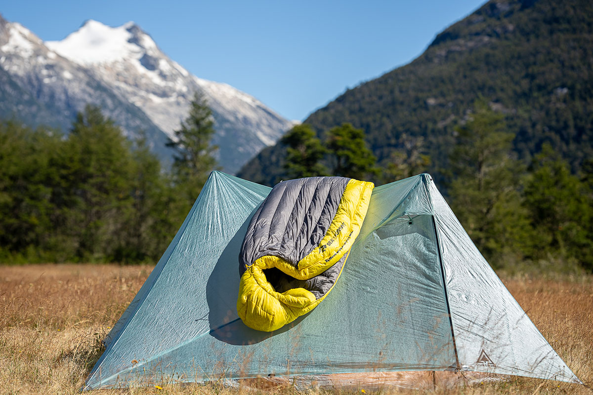 Backpacking sleeping bag (Sea to Summit Spark draped over tent)