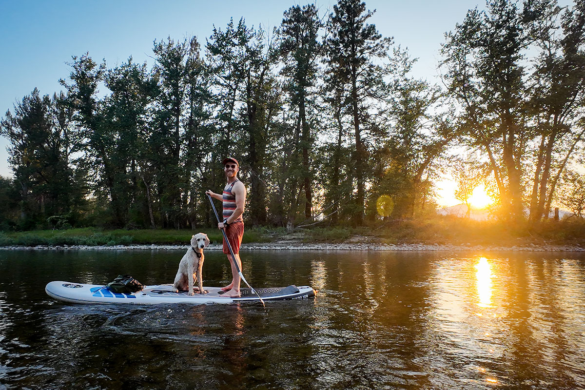 Stand up paddle board (enjoying afternoon paddle with dog)