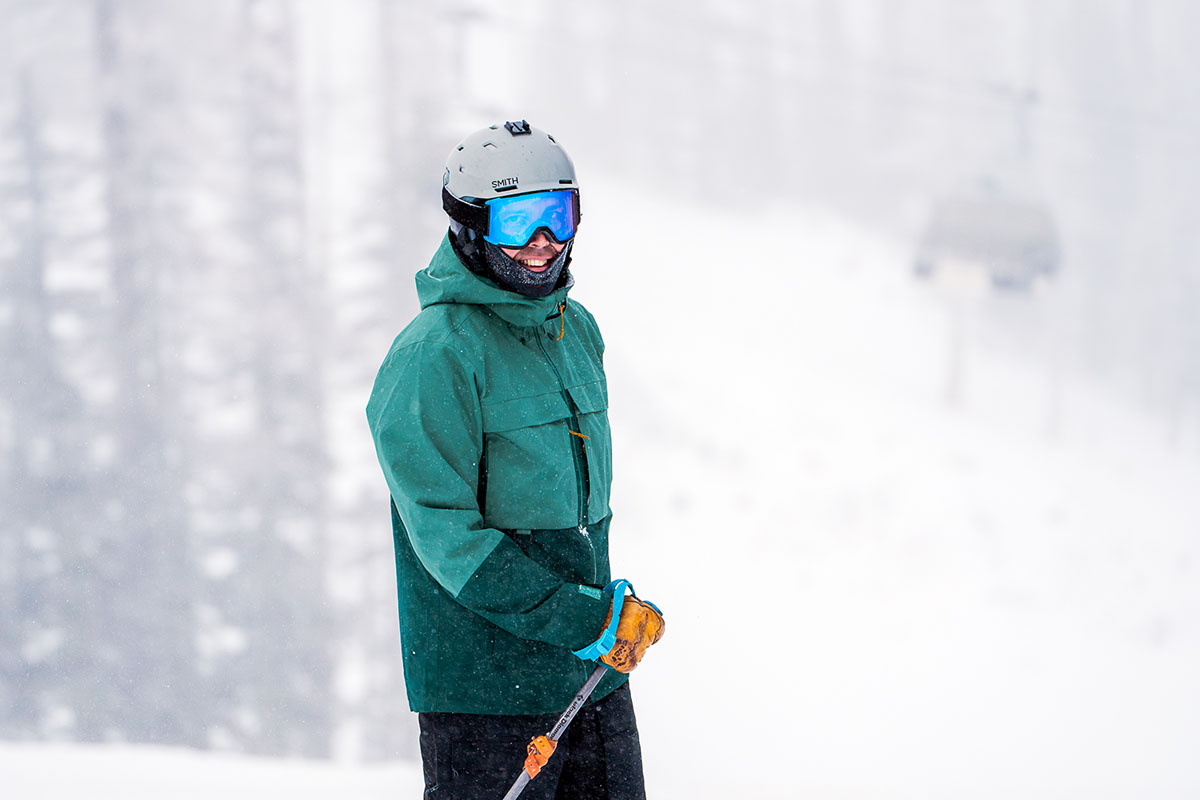 Men's ski jacket (smiling while wearing REI First Chair)