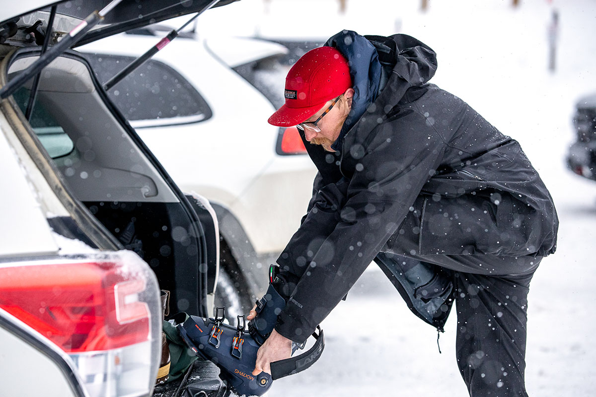 Downhill ski boots (putting on Lange Shadow at car)