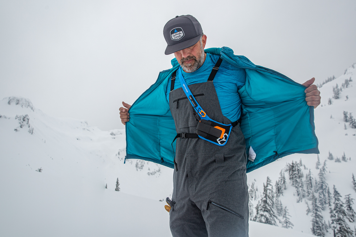 Men's ski bibs (taking off midlayer)