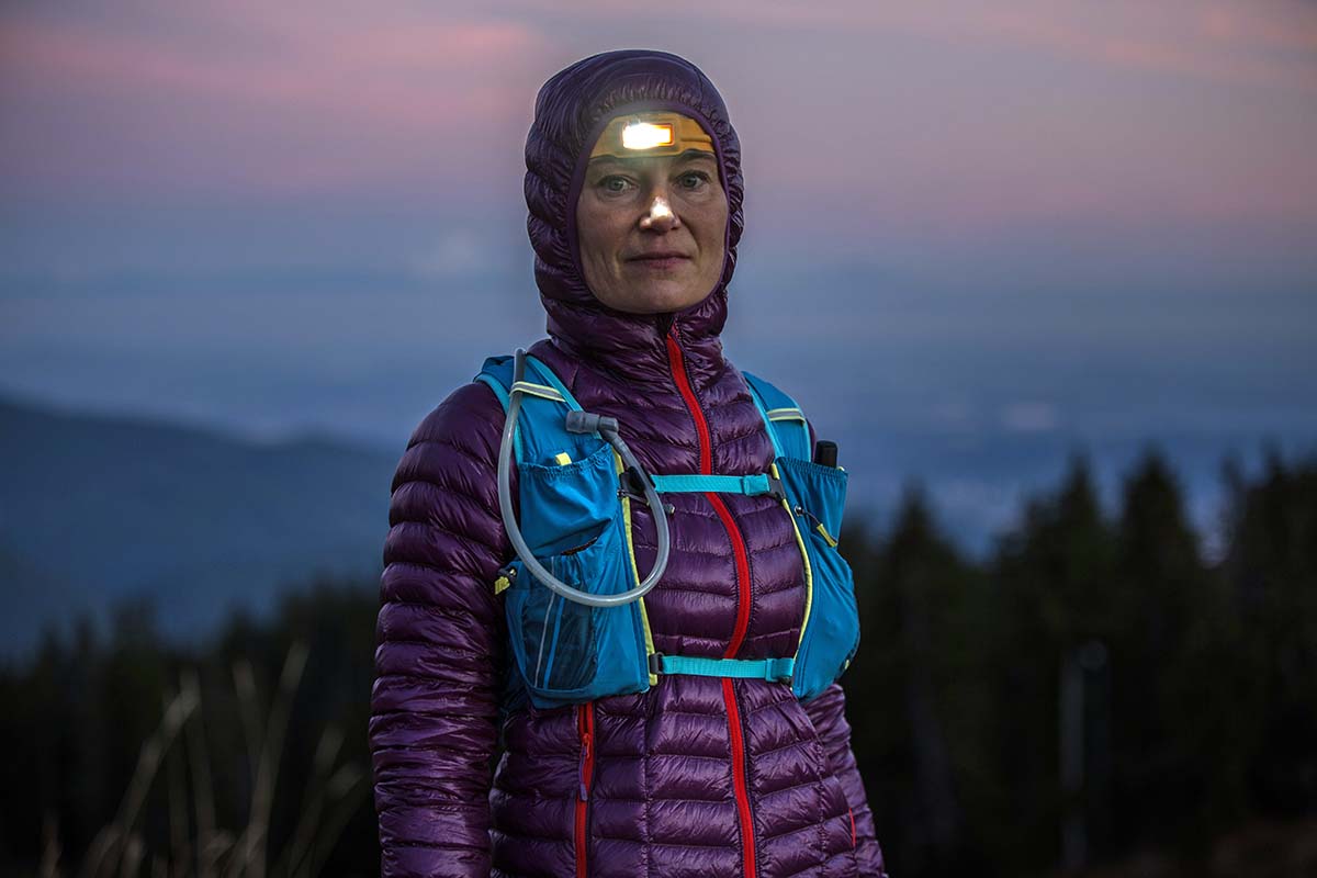 https://www.switchbacktravel.com/sites/default/files/image_fields/Best%20Of%20Gear%20Articles/Trail%20Running/Trail%20Running%20Vests/Running%20vest%20%28wearing%20headlamp%20and%20down%20jacket%29.jpg