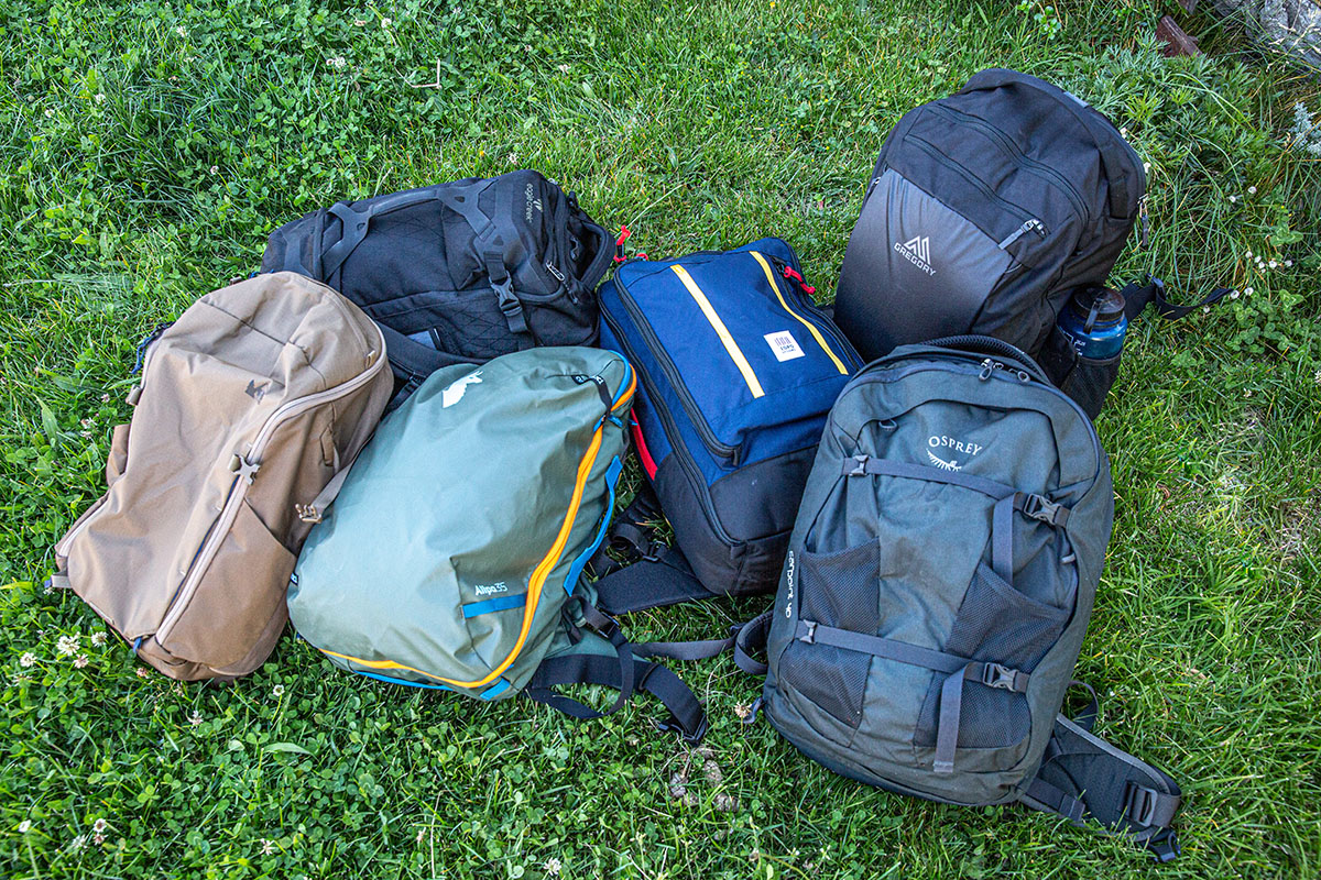 Travel backpacks (lineup on the ground)