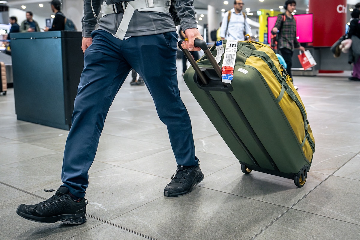 Wheeled Duffels (toting a wheeled duffel bag through a busy airport)