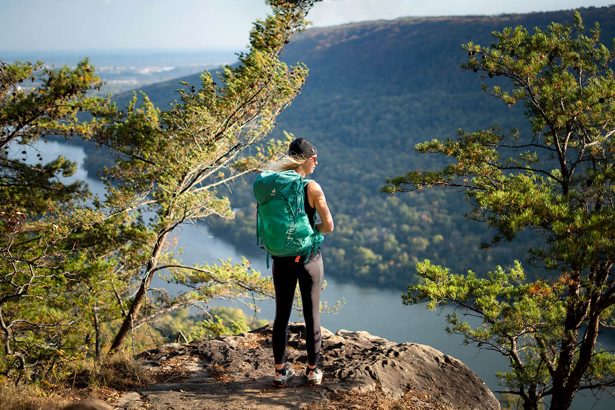 Women's hiking leggings (perched above lake on sunny day)