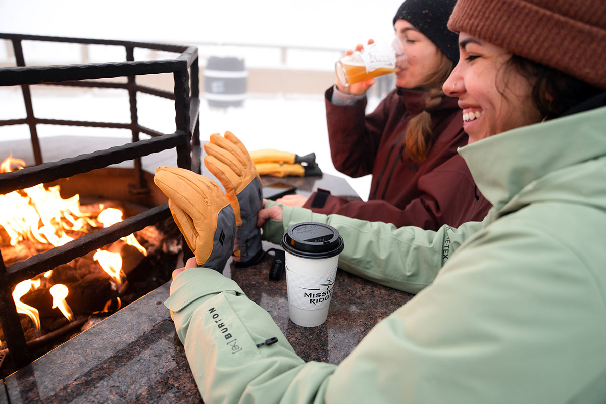 Ski Trip Packing Checklist (warming gloves by fire)