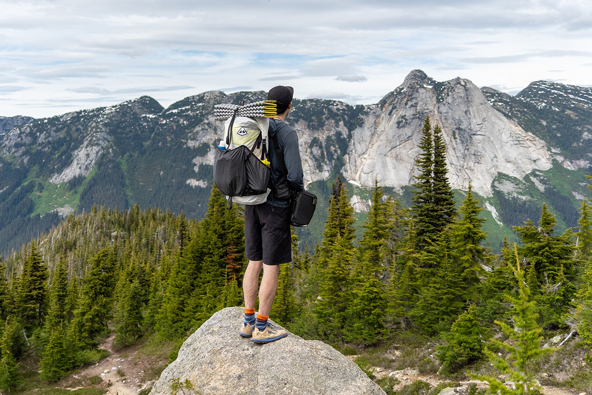 Altra Lone Peak 8 (standing on rock)