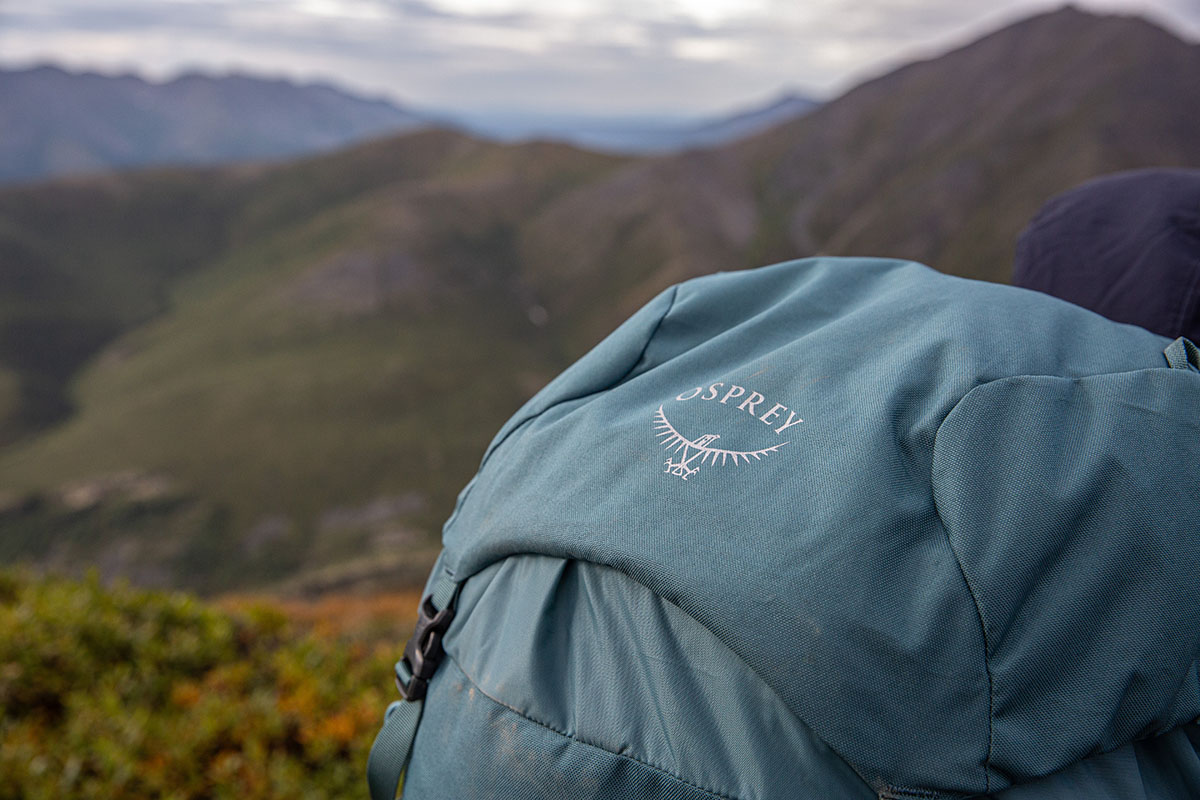 Osprey Renn 65 backpack (logo closeup)