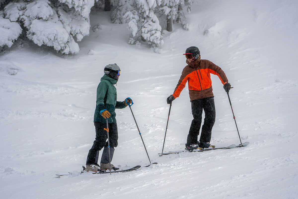 REI First Chair GTX Bibs (talking to friend on slope)