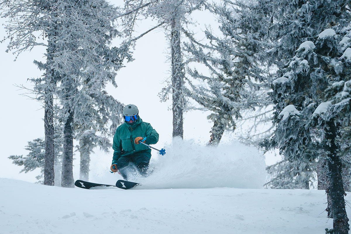 REI First Chair GTX Bibs (turning in powder)