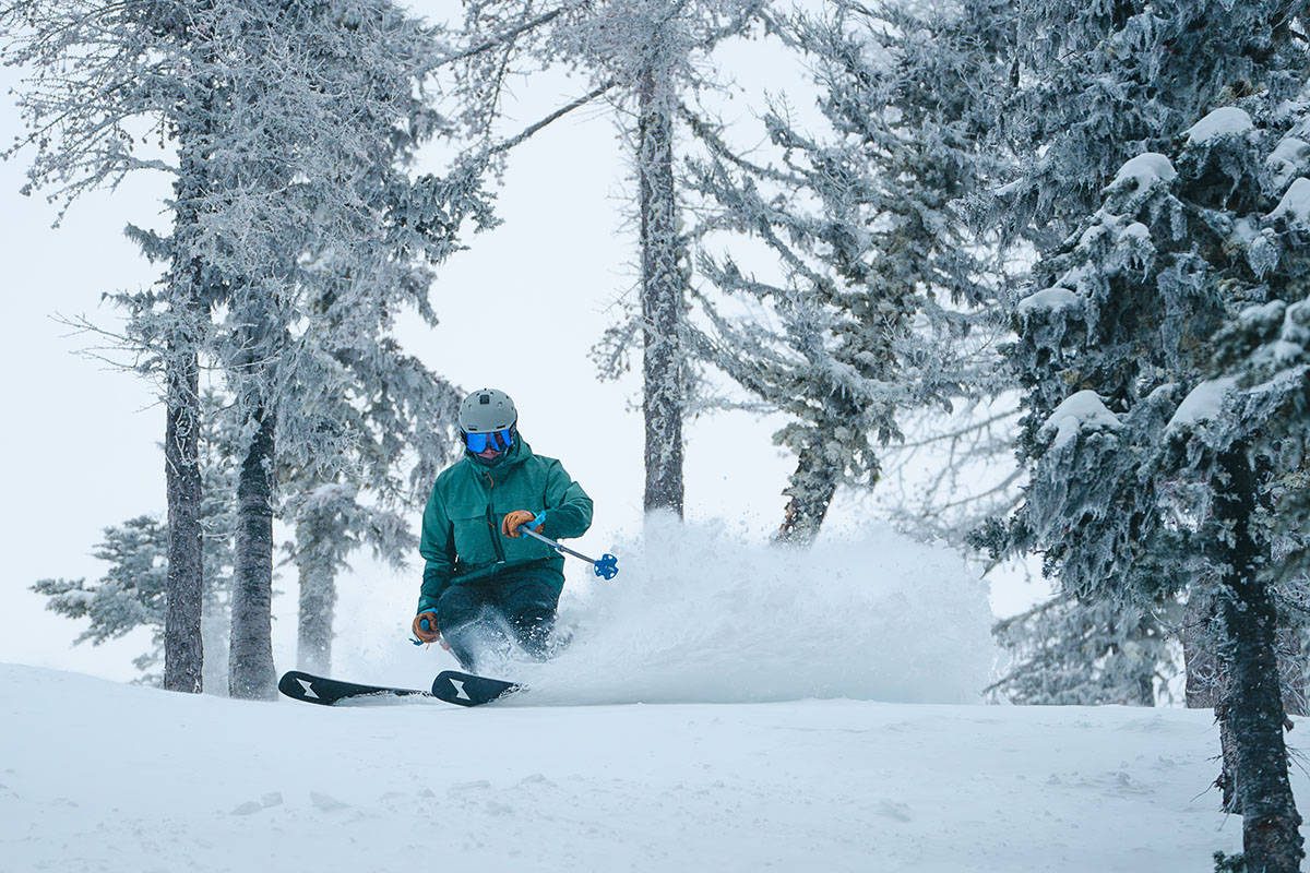 REI Co-op First Chair GTX ski jacket (wide shot while skiing)