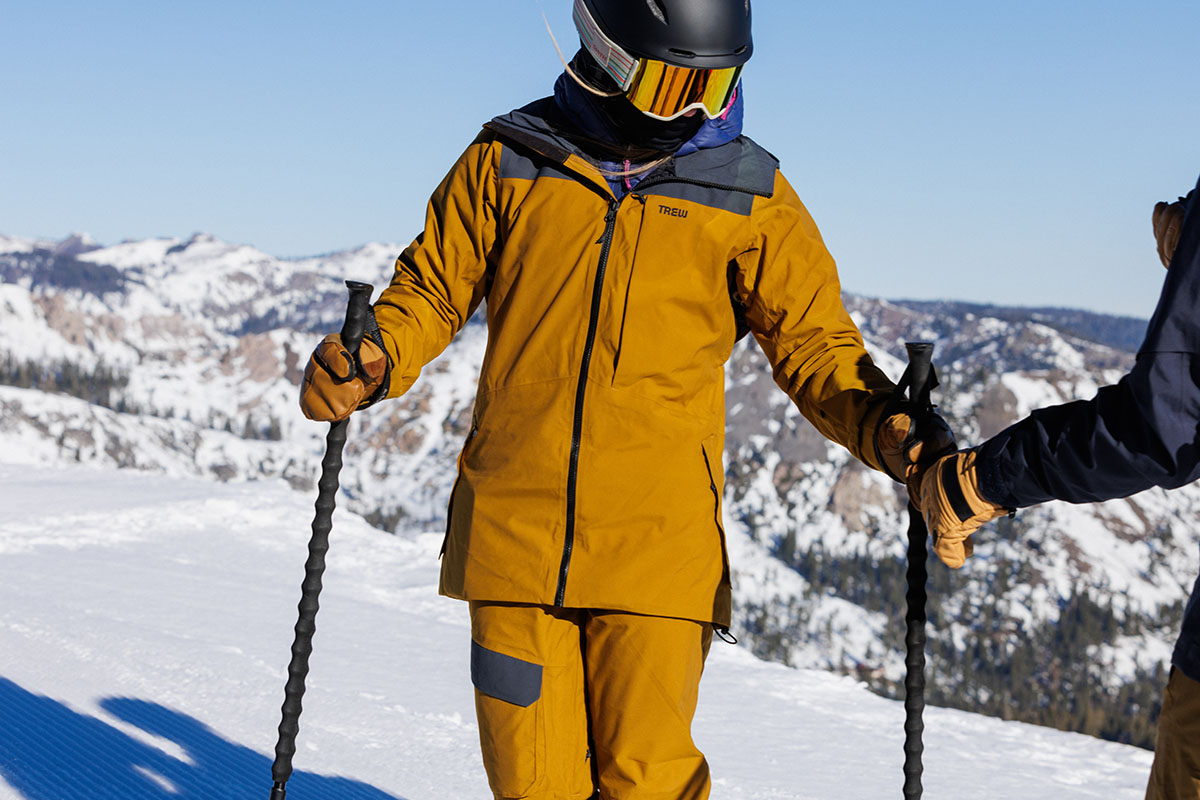 Trew Gear Astoria ski jacket (closeup standing in mountains)