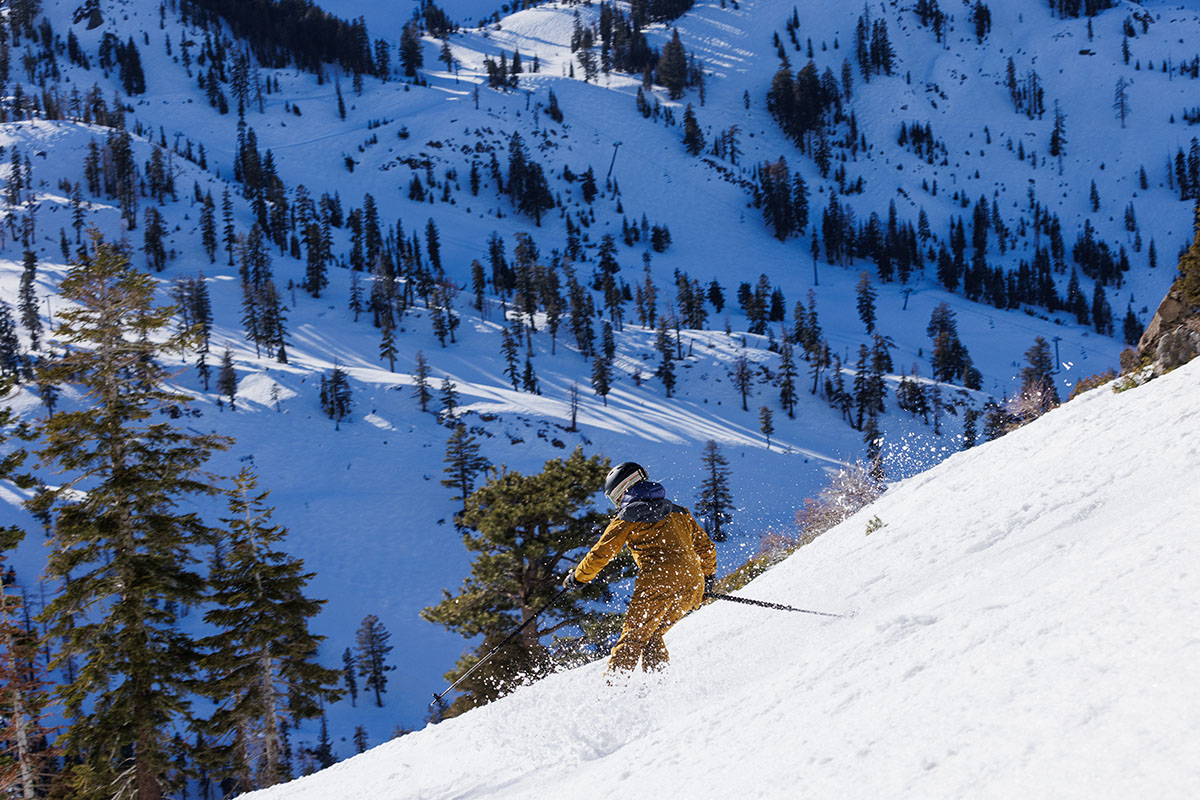 Trew Gear Astoria ski jacket (snow kicking up)