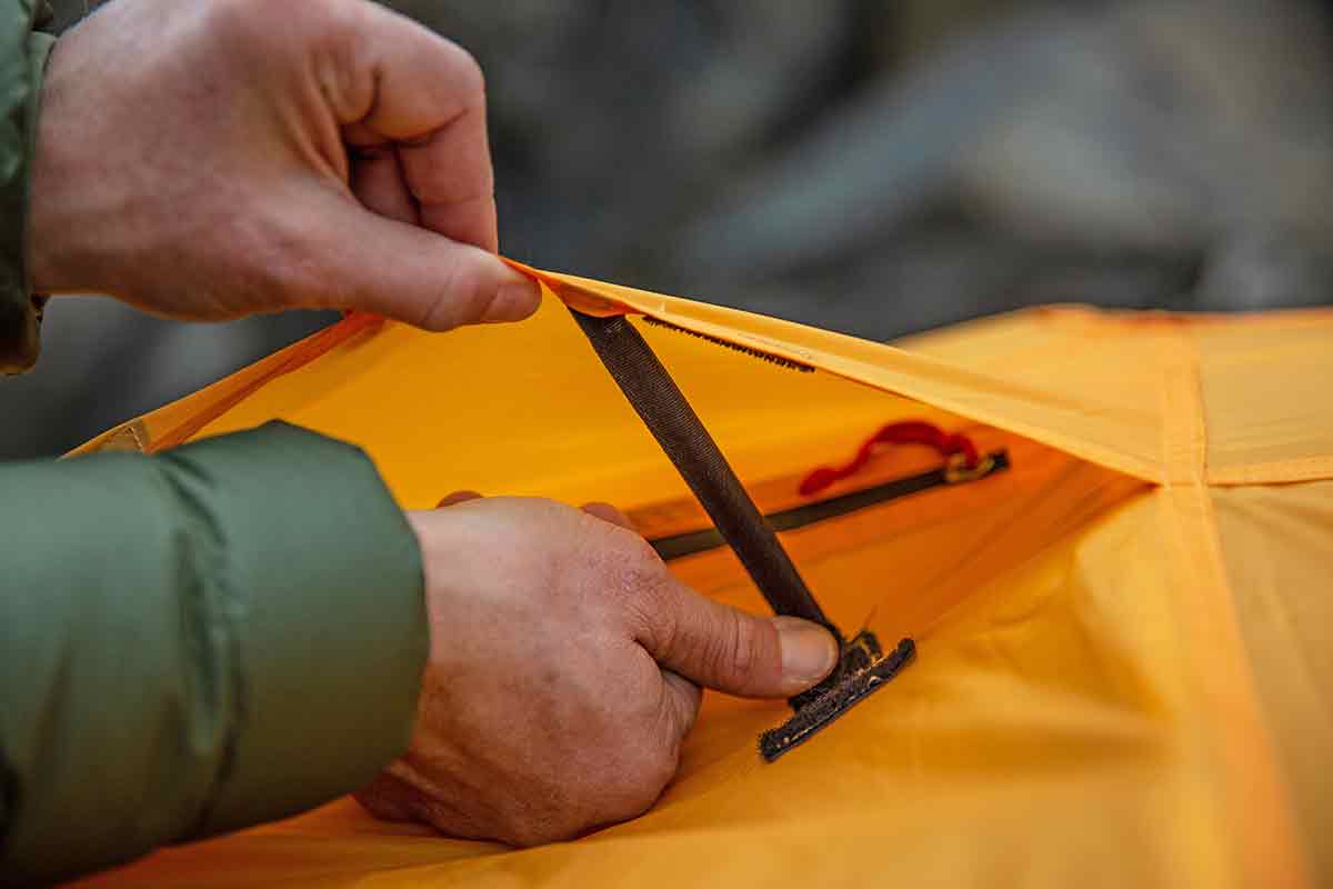 Backpacking tent (deploying vent on REI Trail Hut 2)
