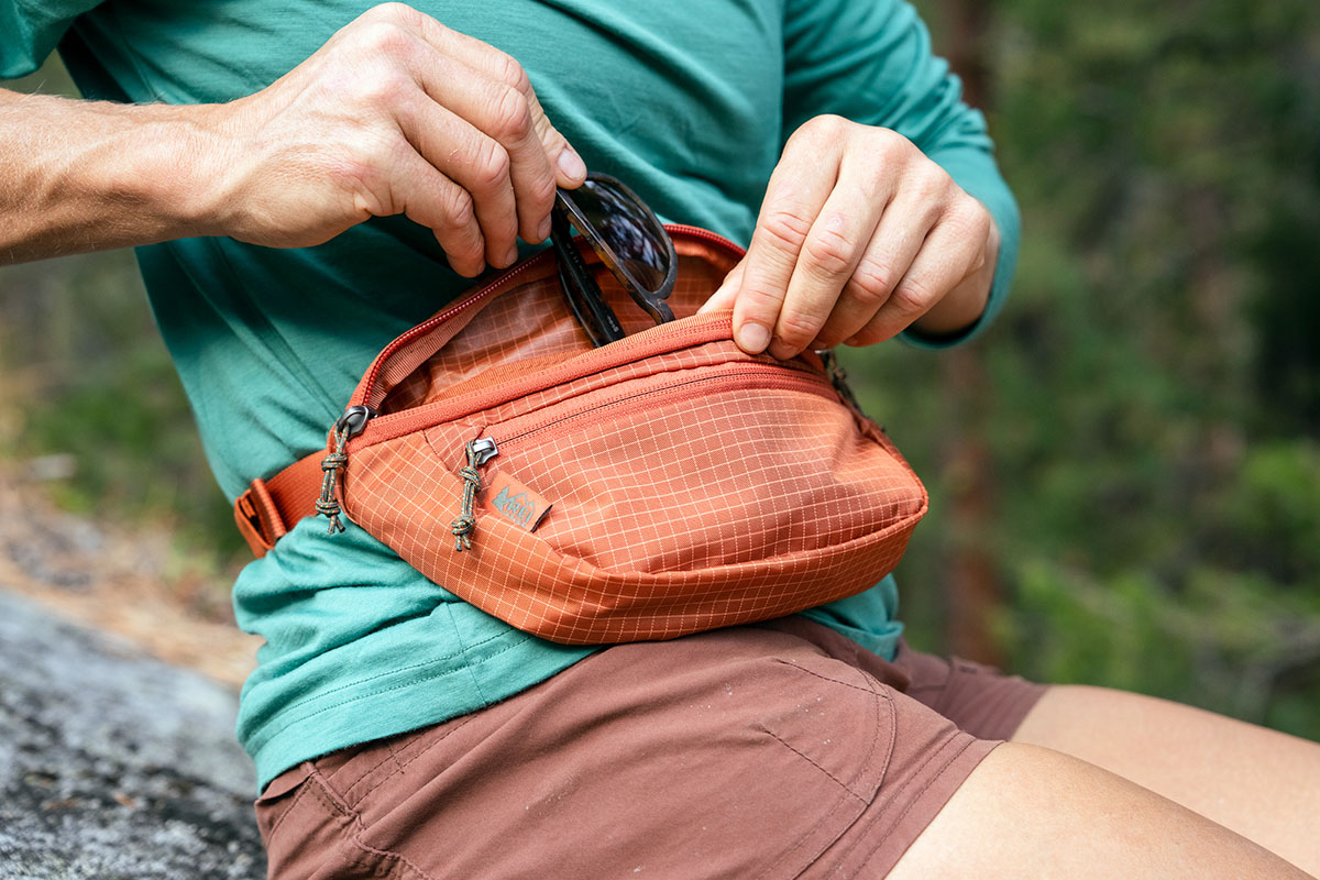 REI Co-op gift guide (sunglasses in Trail 2 Waist Pack)