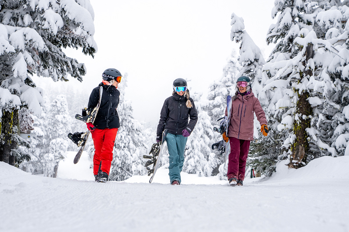 Backcountry Gift Guide (group shot hiking with snowboards)