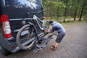 Hitch bike rack (Kuat Racks NV Base 2.0 on van)