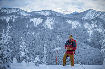 Outdoor Research Hemispheres Bib (standing in snowy backcountry)