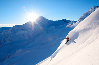 Splitboarding in backcountry (powder turn)