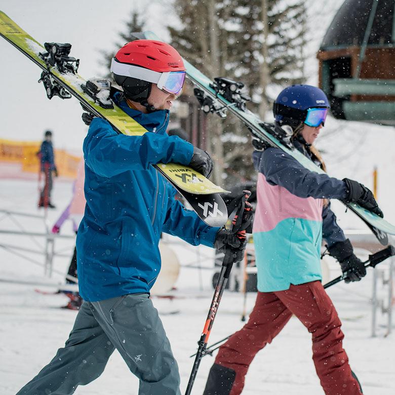 Skis (walking toward chairlift)