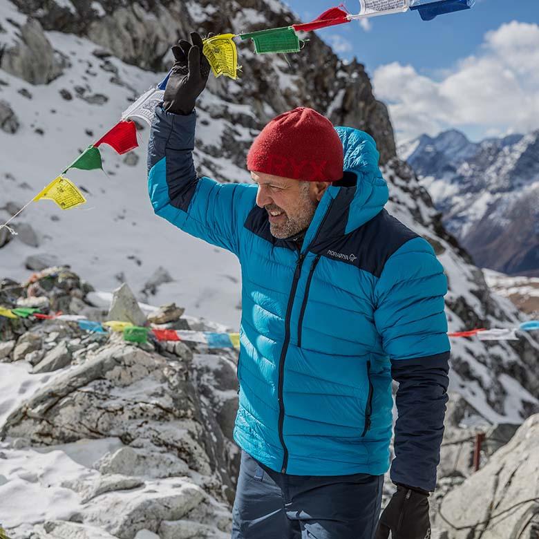 Down jacket (Norrona Falketind standing in Nepal mountains)