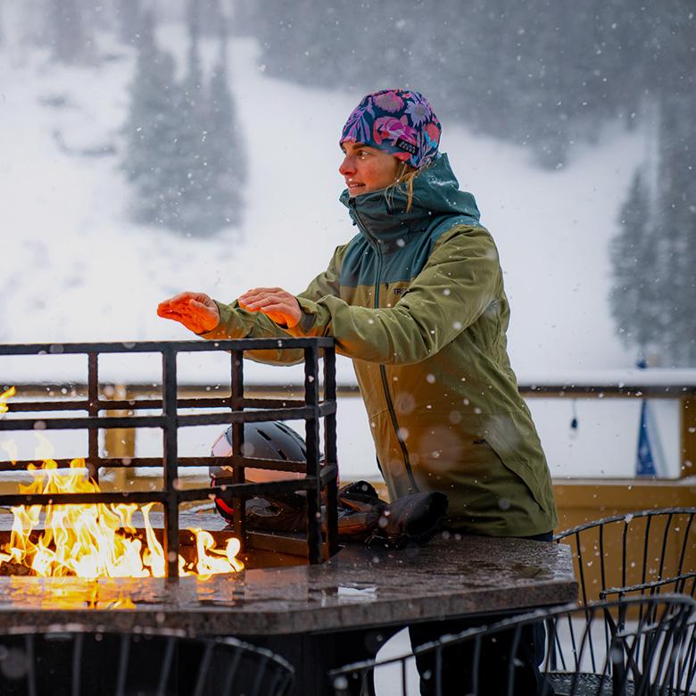 REI Holiday Gift Guide (warming hands over fire pit)