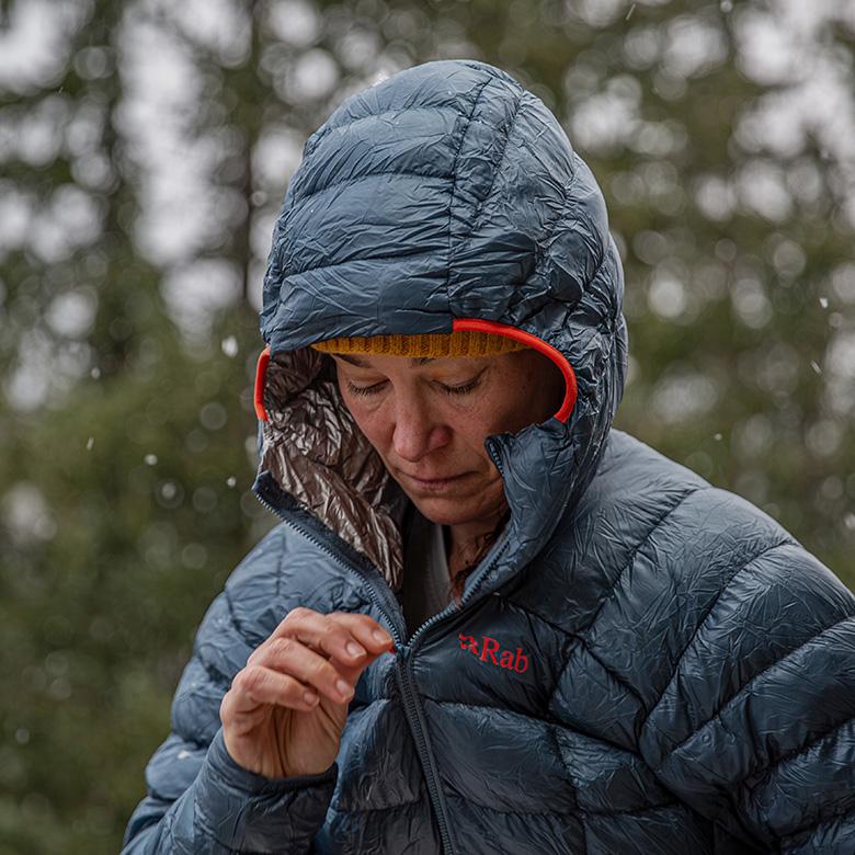 Down Fill and Insulation Explained (zipping up down jacket)